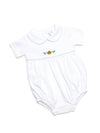 White baby bubble with short sleeves, blue piping, and a hand embroidered pumpkin on the chest.