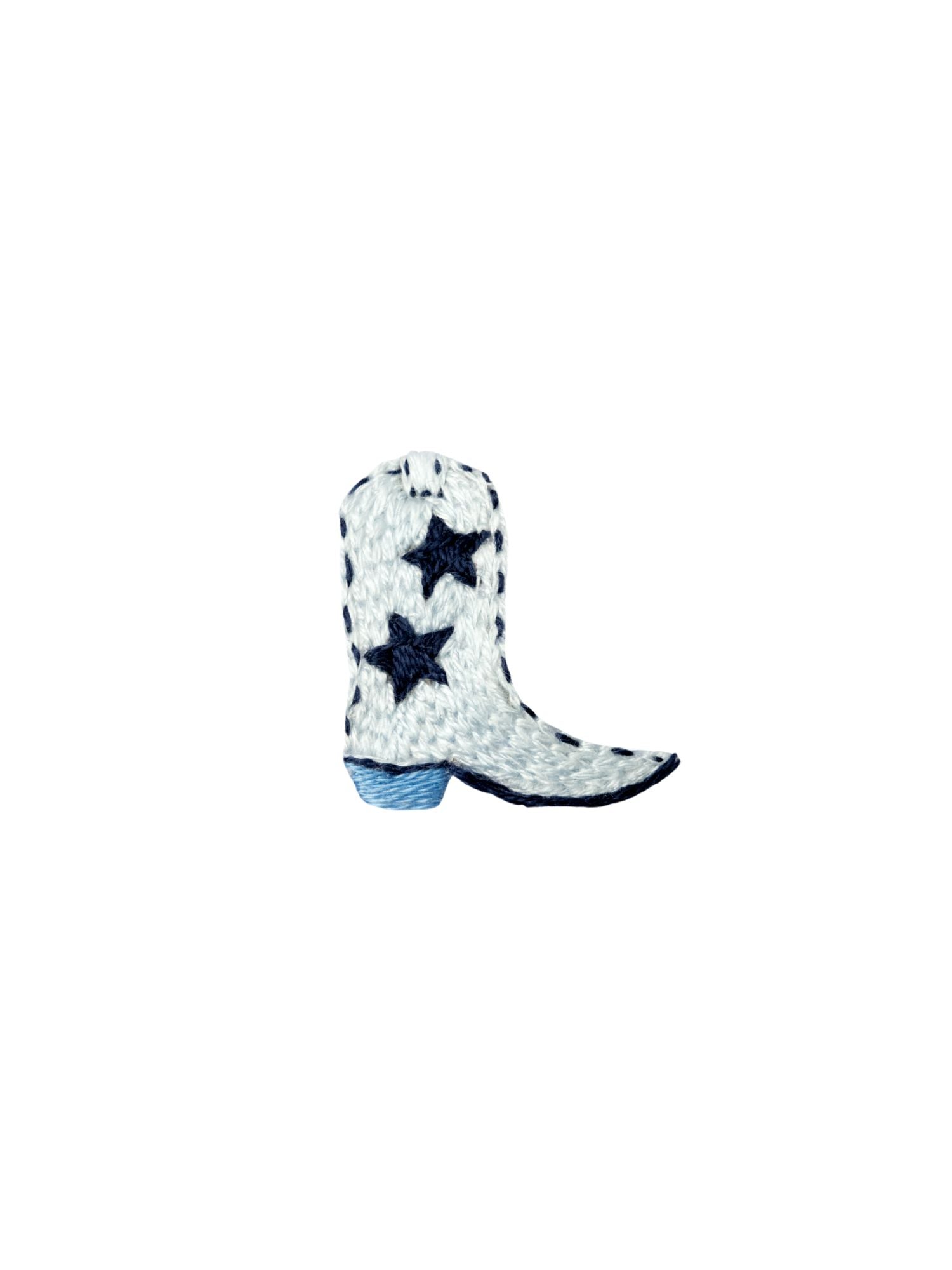 Decorative boot with star embroidery on a white background